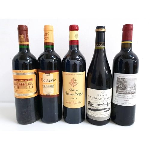 335 - FIVE BOTTLES OF 2005 FRENCH RED WINE
comprising one bottle of Chateau Phelan-Segur Saint-Estephe (13... 