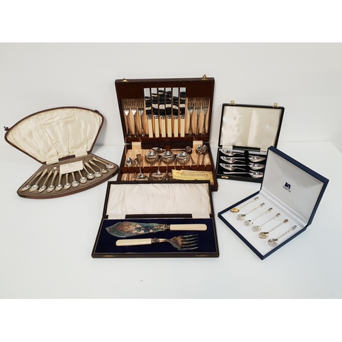 132 - SELECTION OF SILVER PLATED FLATWARE
comprising an ivorine handled pair of fish servers, six coffee b... 