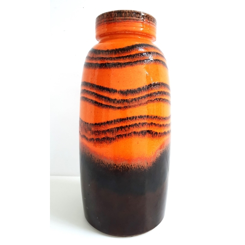 137 - LARGE WEST GERMAN POTTERY VASE
with a waisted neck and orange and brown glaze, 38.5cm high