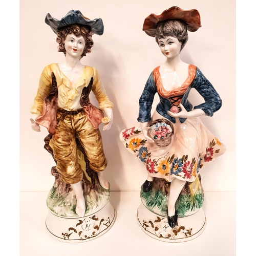 178 - PAIR OF CONTINENTAL POTTERY FIGURINES
depicting a man and lady in 19th century dress, raised on circ... 