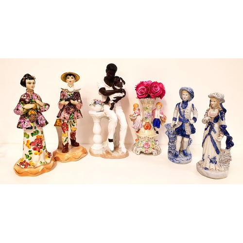 181 - SIX CONTINENTAL POTTERY FIGURINES
comprising a Japanese man and woman, 36cm high, man and woman in 1... 