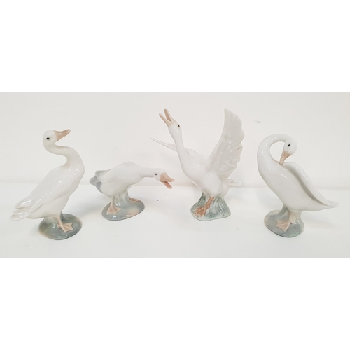 187 - FOUR LLADRO GEESE FIGURINES
one standing 4552, 11.5cm high, one preening it's feathers 4553, 10.5cm ... 