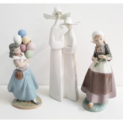 189 - THREE LLADRO FIGURINES
comprising two nuns with rosary beads 4611, 33cm high, Dutch girl with flower... 