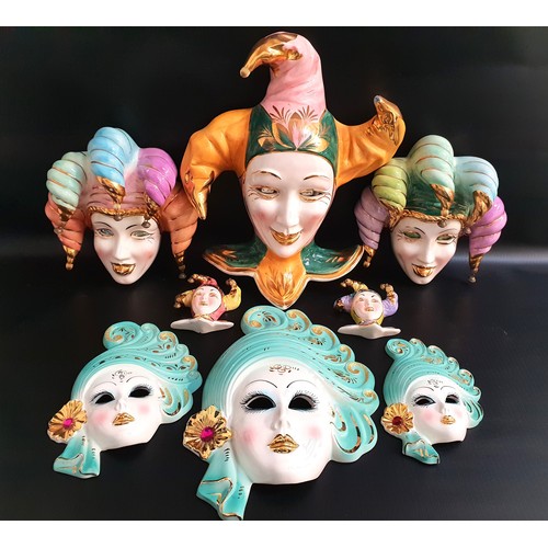 179 - THREE POTTERY VENETIAN WALL MASKS
32.5cm, 24cm and 19.5cm high, together with five pottery Jester wa... 