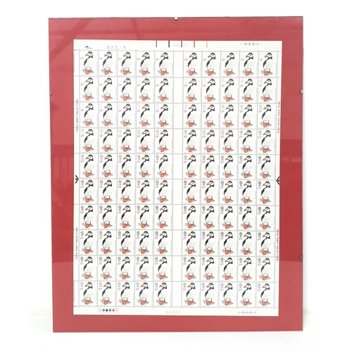 238 - FULL SHEET OF RSPB STAMPS
featuring one hundred Puffin 19pence stamps, 44cm x 33cm, framed