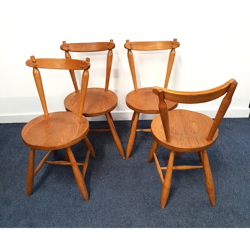 394 - SET OF FOUR BAKKER AND STEYGER OAK DINING CHAIRS
with a shaped top rail on turned tapering columns a... 