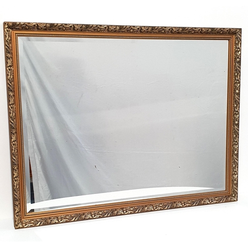 442 - LARGE RECTANGULAR WALL MIRROR
with a gilt frame and a bevelled plate, 111.5cm x 86cm