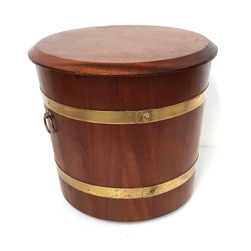 448 - MAHOGANY AND BRASS BOUND LOG BIN
with a circular lift off lid and side carrying handles, 36.5cm high