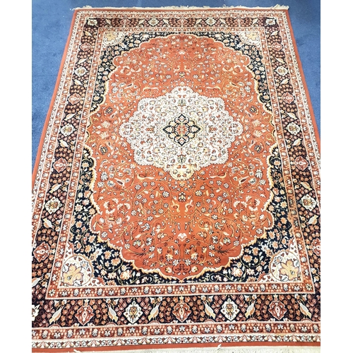 349 - LARGE SAROUK RUG
with a central floral border decorated cream ground medallion encased by a brown an... 