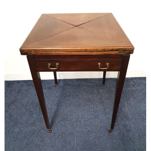 367 - EDWARDIAN MAHOGANY ENVELOPE CARD TABLE
with a square rotating fold out top above a frieze drawer wit... 