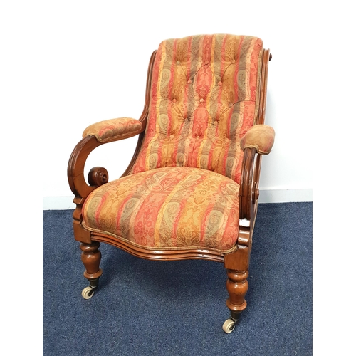 369 - VICTORIAN MAHOGANY ARMCHAIR
with a button back above padded scroll arms and a shaped seat, standing ... 