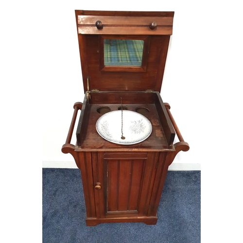 386 - EDWARDIAN MAHOGANY WASHSTAND
with a lift up lid revealing a mirror above a floral decorated washbowl... 