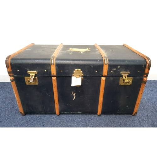 392 - VINTAGE TRAVEL TRUNK
with a banded body and lift up lid, 48cm x 92cm x 54cm