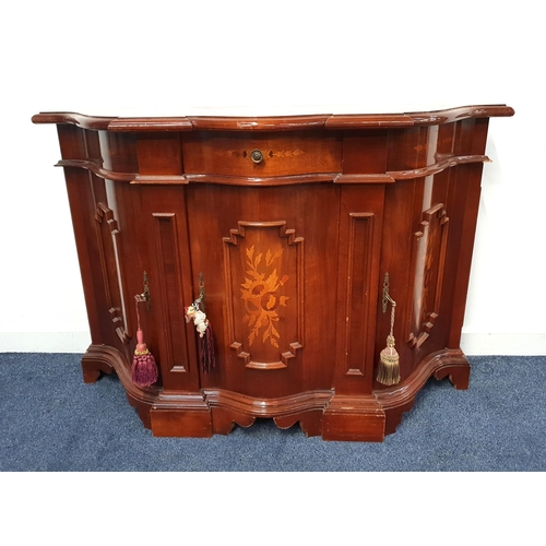 421 - CONTINENTAL WALNUT CREDENZA
with a shaped moulded top above a central frieze drawer with three panel... 