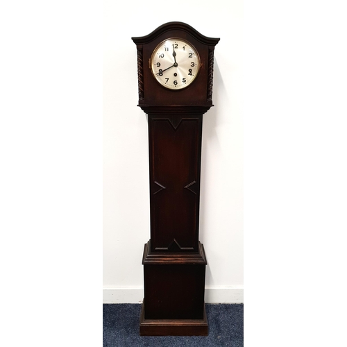 346 - OAK GRANDMOTHER CLOCK
with a circular silvered dial with Arabic numerals and a Westminster chime eig... 