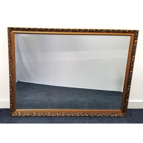 359 - LARGE RECTANGULAR WALL MIRROR
with a giltwood frame and bevelled plate, 89cm x 119.5cm