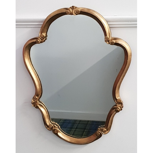 361 - SHAPED GILTWOOD MIRROR
with a plain plate, 60cm high