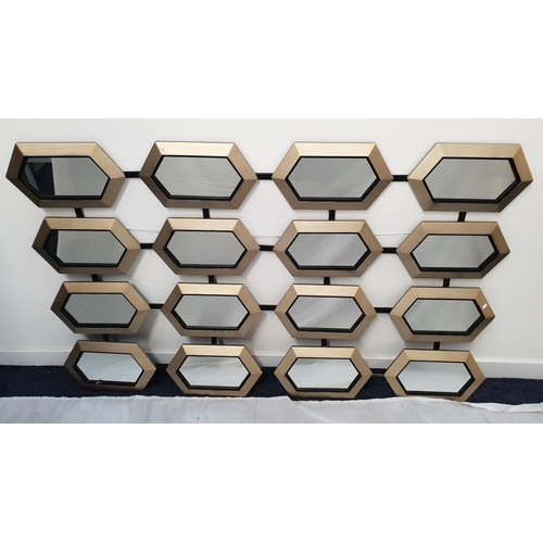 374 - SIXTEEN PANEL MIRROR
with 16 hexagonal champagne coloured individual mirrors, 103cm x 169.5cm