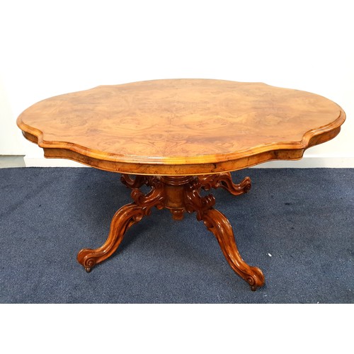 368 - VICTORIAN FIGURED WALNUT LOO TABLE
with a shaped tilt top on a walnut and figured walnut base with a... 