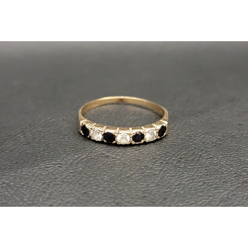75 - SAPPHIRE AND CZ SEVEN STONE RING
in nine carat gold, ring size T and approximately 1.6 grams