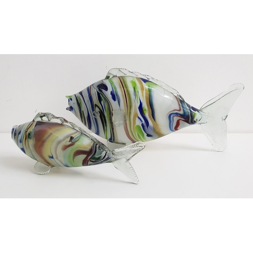 144 - PAIR OF GRADUATED 20th CENTURY GLASS FISH
with a multi coloured bodies and clear glass fins and tail... 