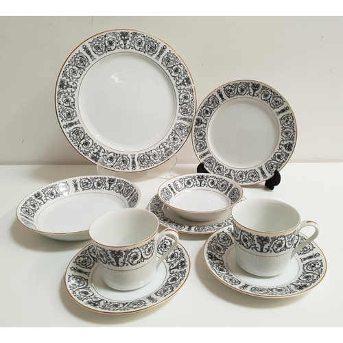 176 - COVENTRY FINE CHINA DINNER/TEA SET
in the Laurent pattern (number 653), all with black scroll border... 