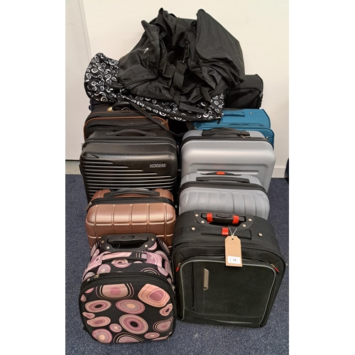 73 - SELECTION OF TEN SUITCASES AND TWO HOLDALLS
including American Tourister, Antler, IT Luggage
Note: A... 