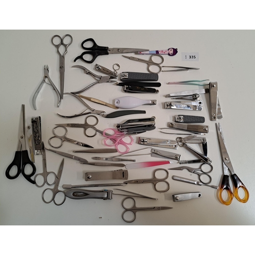SELECTION OF SCISSORS, NAIL CLIPPERS, TWEEZERS AND NAIL TOOLS
Note: You must be over the age of 18 to bid on this lot.