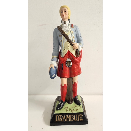 193 - PRINCE CHARLIE DRAMBUIE ADVERTISING FIGURE
in pottery and wearing traditional attire, 33.5cm high