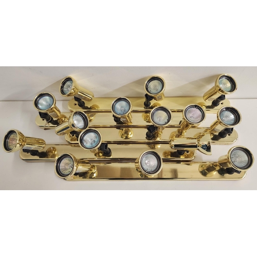 269 - FIVE STRIPS OF BRASS SPOTLIGHTS
each with three adjustable lights, each 58cm long (5)