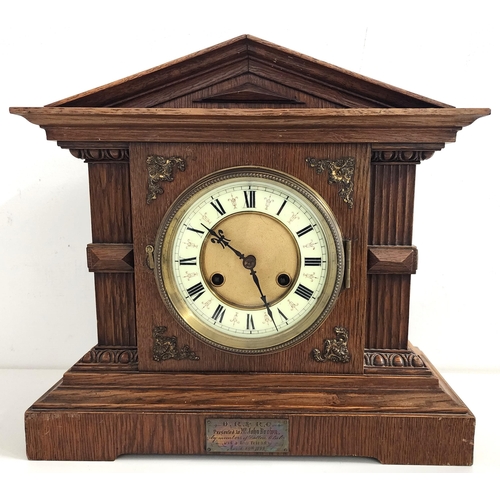 294 - VICTORIAN OAK CASED MANTLE CLOCK
with a circular enamelled dial with Roman numerals and an eight day... 