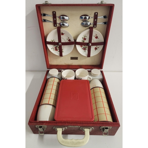 307 - VINTAGE BREXTON FITTED HAMPER
for four people, comprising four cups and saucers with tea spoons, two... 