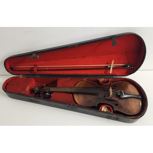 CONTINENTAL VIOLIN
with a two piece 14" back, lacking one string, with two chin rests and a 73.8cm long bow with mother of pearl inlay, cased