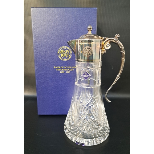 218 - BOXED EDINBURGH CRYSTAL CLARET JUG
inscribed to the silver plated collar, 'Bank Of Scotland Tercente... 