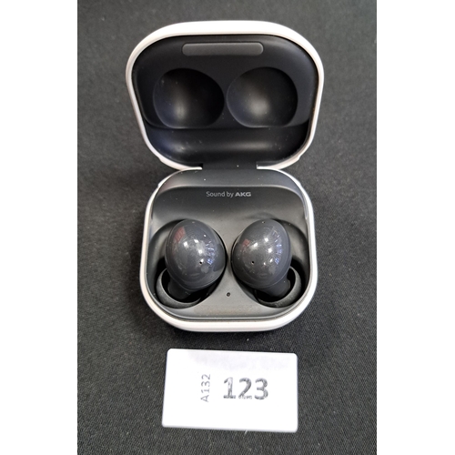 PAIR OF SAMSUNG EARBUDS
in charging case, model SM-R177