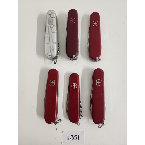 351 - FIVE VICTORINOX SWISS ARMY KNIVES
of various sizes and designs with one other Swiss army knife
Note:... 