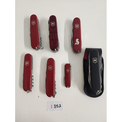 SEVEN VICTORINOX SWISS ARMY KNIVES
of various sizes and designs
Note: You must be over the age of 18 to bid on this lot.