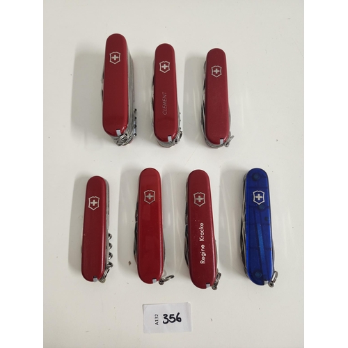 356 - SEVEN VICTORINOX SWISS ARMY KNIVES
of various sizes and designs, two with personalisation 
Note: You... 