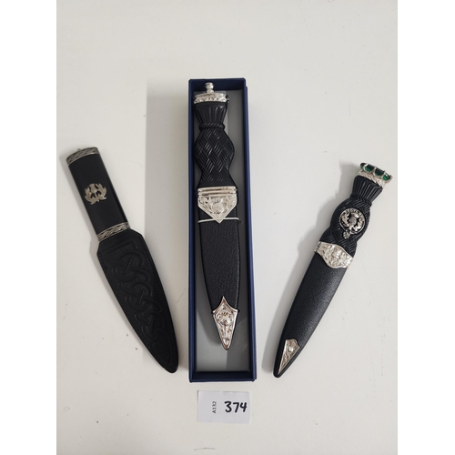 374 - THREE SGIAN DUBHS
one in box by The Sgian Dubh Co.
Note: You must be over the age of 18 to bid on th... 