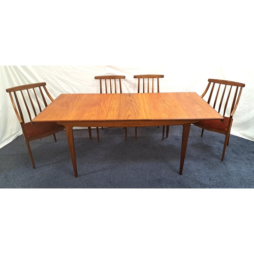 MID-CENTIRY TEAK EXTENDING DINING TABLE AND FOUR CHAIRS
the table with a rectangular pull apart top revealing a fold out leaf, standing on turned and tapering supports, 191cm extended, together with a set of two carver and two other stick back chairs with orange velvet covered seats