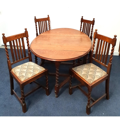 430 - OAK GATELEG TABLE AND FOUR CHAIRS
the table with shaped drop flaps, standing on barley twist support... 