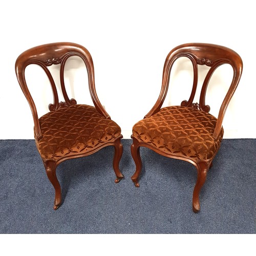 436 - PAIR OF VICTORIAN MAHOGANY CHAIRS
with a continuous shaped top rail above a pierced splat and shaped... 