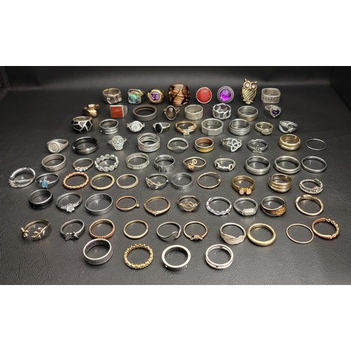 111 - SELECTION OF SILVER AND OTHER RINGS
including spinner rings, bands, stone set rings, etc.