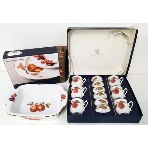 LARGE SELECTION OF ROYAL WORCESTER
in the Evesham pattern, comprising six lidded chocolate pots, eight mugs, four saucers, four soup bowls and saucers, four entrée plates, four dinner plates and a rectangular serving dish, all boxed