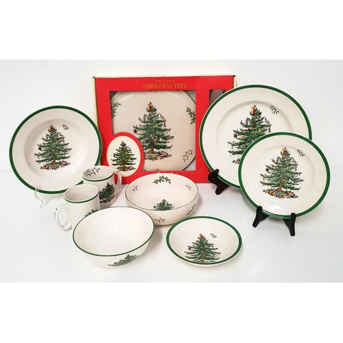 243 - SPODE CHRISTMAS TREE PATTERN DINNER SERVICE
comprising four soup plates, ten side plates, fourteen d... 