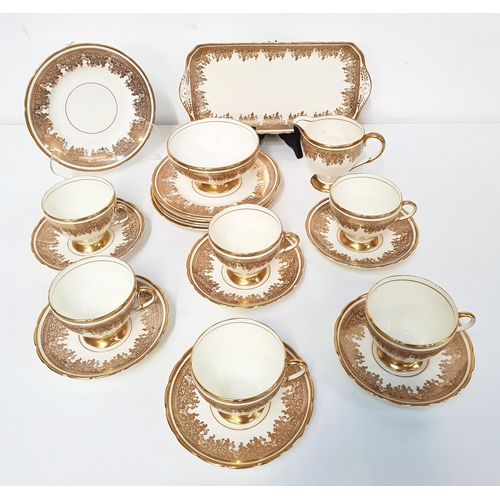 250 - FOLEY BONE CHINE TEA SET
all decorated with gilt on a cream ground, comprising six cups, saucers and... 