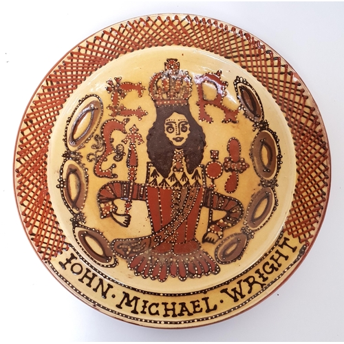 ENGLISH SLIPWARE DISH
after John Michael Wright in the 17th century style, decorated with Charles I as king, 45cm diameter