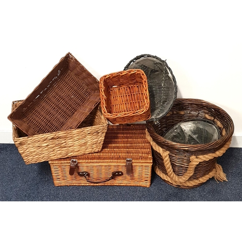 274 - WICKER PICNIC BASKET
with strap closure and carry handle, two circular wicker hanging baskets, circu... 