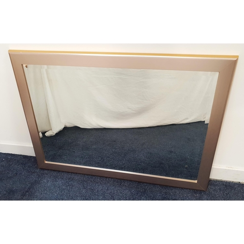 LARGE SILVER AND GILT RECTANGULAR WALL MIRROR
with a bevelled plate, 102cm x 72cm