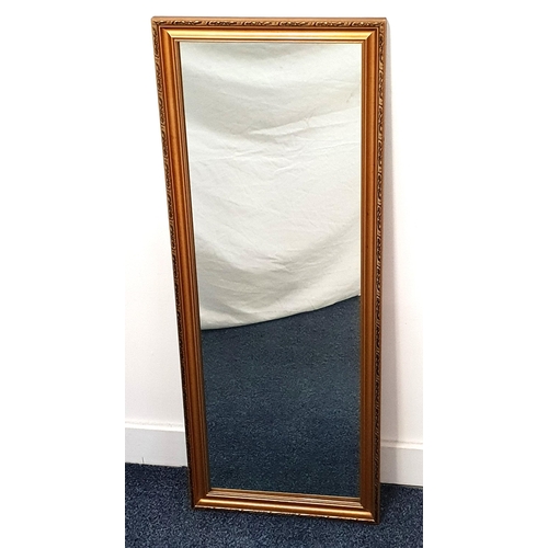 466 - RECTANGULAR WALL MIRROR
in a gilt frame with a plain plate, 92cm x 36cm